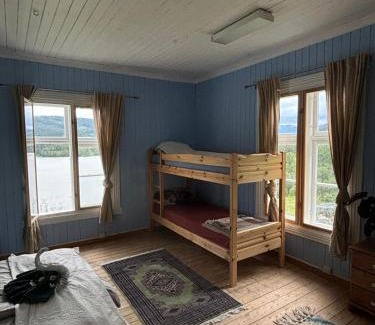 Vestre Slidre Apartment | The blue room at Vevstogo - cosy with a mesmerizing view, sauna and eco living in an old school house