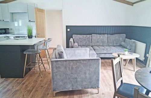 Langworth Ski Chalet | The Country oak is a 2 double bedroom lodge with en suites to both rooms.