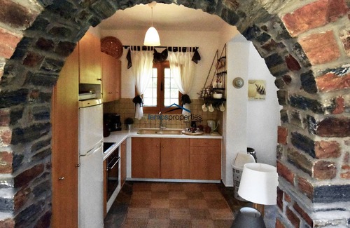 Vourkari House | The Garden House only a 2 minute walk from the marina of Vourkari