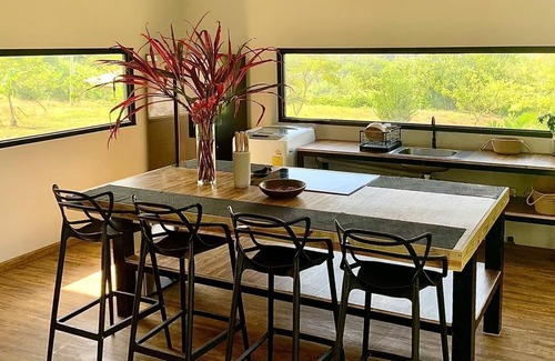 Couva-Tabaquite-Talparo Villa | The Glass House | Tranquil Luxury Above the Trees.