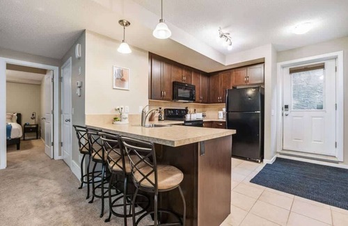 Southeast Calgary House | The Grande 1BD 1BA - Full Kitchen Guest Suite