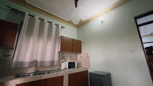 Kampala Apartment | The High Altitude Homestay Cozy 3 Bedroom House near Training Center, Kapchorwa