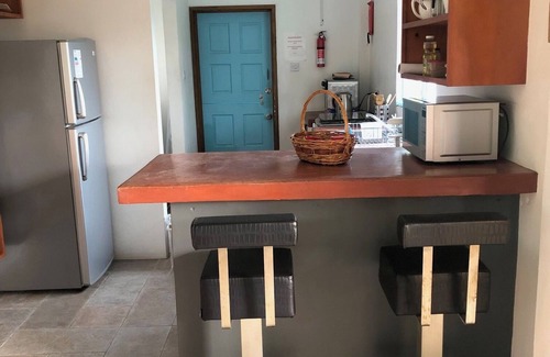 St. George's Apartment | The LEEWARD - Views of world class marina and the city