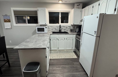 Prince George Apartment | The Paddle On Inn! A canoe-themed basement suite with all the modern finishes!