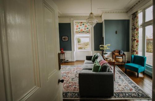 Grange-over-Sands Apartment | The Pheasant Lodge Spacious Cosy Georgian Apartment with Garden Views & Log Fire