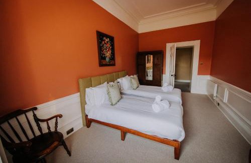 Grange-over-Sands Apartment | The Pheasant Lodge Spacious Cosy Georgian Apartment with Garden Views & Log Fire