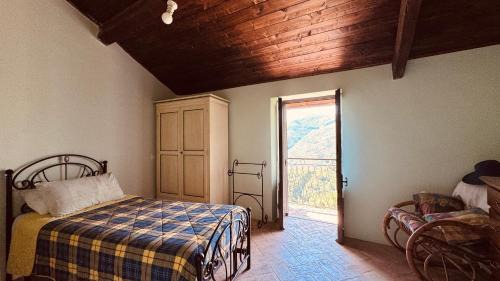 Pornassio House | The quiet yellow house