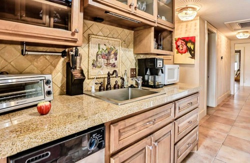 Maple Ridge Apartment | The Teak Follow, beautiful brick enclosed space