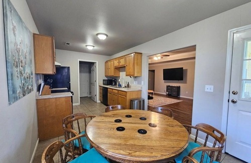 Bentonville House | The Weekender Family & MTB Retreat with garage, playhouse, firepit, sleeps 7+