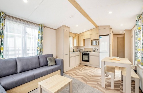 Kirkcudbright House | This 2 bedroom caravan sleeps 4 people in one double and one twin bedroom.