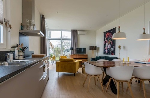 Burgh-Haamstede House | This attractive chalet is located in a beautiful location at the back of Schouwenduin, surrounded by