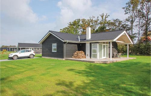 Arø House | Three-Bedroom Holiday Home Haderslev With A Fireplace 01