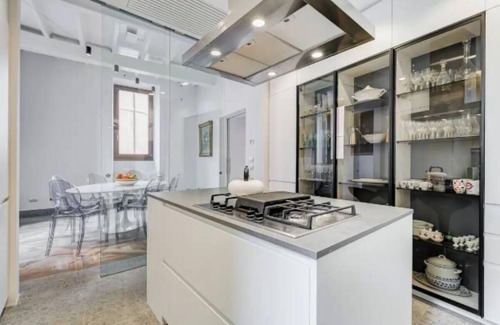Rione VII Regola Apartment | Timeless Charm in Trastevere Luxury Residence with Enchanting Courtyard