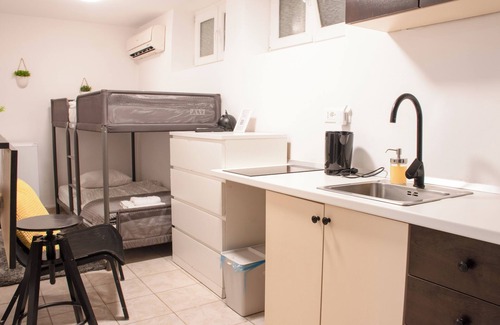 Zagreb Apartment | Tiny Studio w Ensuite Bathroom, Queen Bed, 42" TV & AC