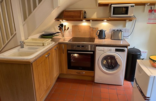 Shipton Gorge Cottage | Traditional Dorset Stone Cottage, large garden, pretty village near sea.