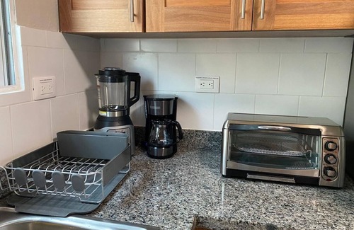 Llanos de Gurabo I Apartment | Tranquil Oasis Fully Stocked to make you feel like you are at home.