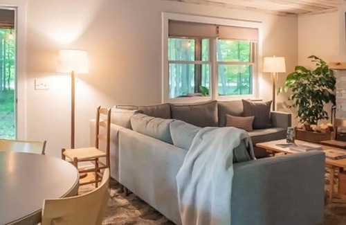 Maple City House | Tree-lined abode with a sprawling deck, large yard, grill, firepit, & central AC