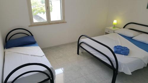Torre dell'Orso House | Trilocale con doppio giardino 9