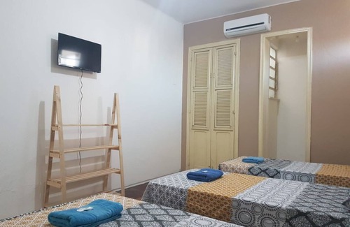Aldeota House | Triple room with private bathroom, Wi-Fi, air conditioning and TV.