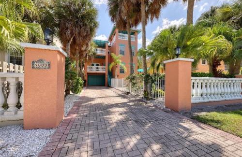 Holmes Beach House | Tropical luxury pool home by the beach with roof top lounge centrally located on Anna Maria Island