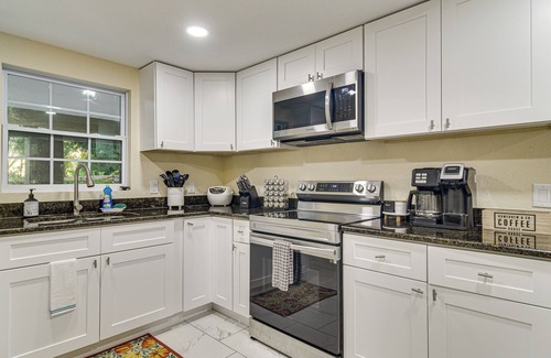 Greater Palm River Point CDC Cottage | Tropical Tampa Home: Pets Welcome!