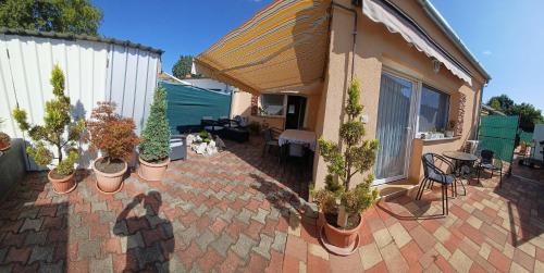 Bukfurdo House | Tulipán Apartmanház