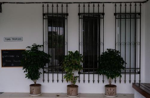 Ipoh House | Tung's Tropika - With a Wooden Hut by a Lake