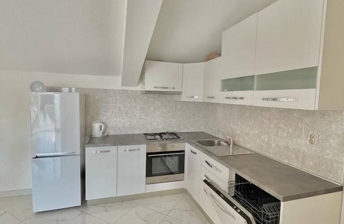 Povlja Apartment | Two bedroom apartment with balcony and sea view Povlja, Brač (A-21810-a)