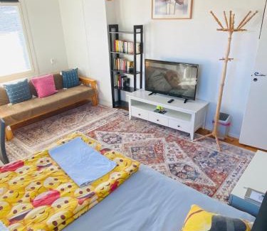 Kotka House | two bedrooms,dining area and bathroom with private entrance