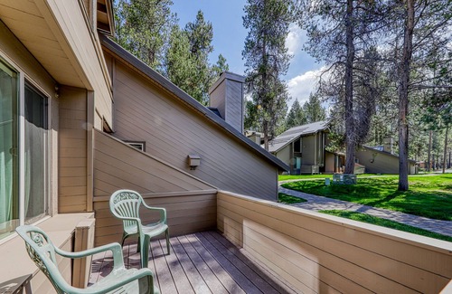 Tennis Village Condo | Two-story home with wood fireplace, central AC & washer/dryer