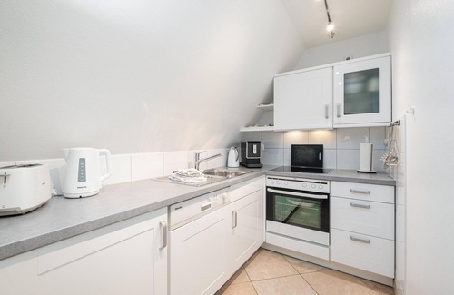 Norddorf Apartment | Upper floor apartment on 2 levels, up to 4 persons, with beach chair in the garden