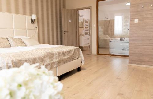 Ujhartyan Hotel | Vánkos & Eszcájg