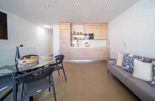 Caleta de Famara Apartment | Vacation 'Kay Lava' with Mountain View, Wi-Fi and Air Conditioning