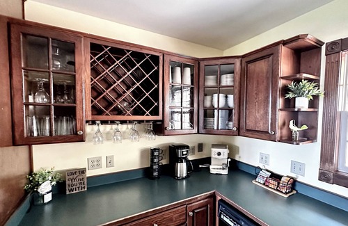 Medford Cottage | Wake to breathtaking sunrises over the rolling hills! Relax by the fire under the stars, & savor sunset dinners beneath fragrant wisteria pergola. Surrounded by wineries and minutes from historic Jacksonville, this retreat blends charm & convenience