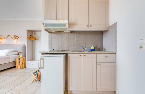 Gaios Apartment | Wake up to stunning sea views at Paxi Apartment in the heart of Gaios