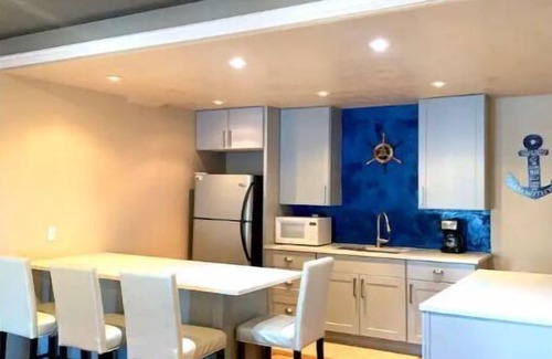 South Jordan Apartment | Walkout Basement Apt w/Waterslide, Hot Tub & Moren
