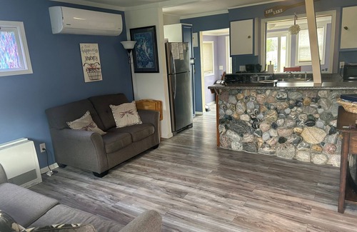 Elk Rapids Cottage | Waterfront cottage in Elk Rapids on Bass Lake. Firepit Pet ok