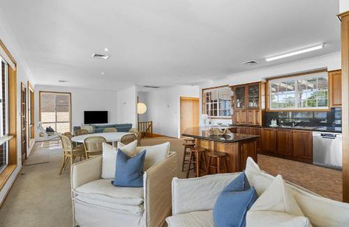 Sunshine House | Waterfront Vista Escape with Games Room Jetty Access & Expansive Views