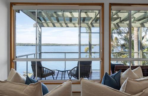 Sunshine House | Waterfront Vista Escape with Games Room Jetty Access & Expansive Views
