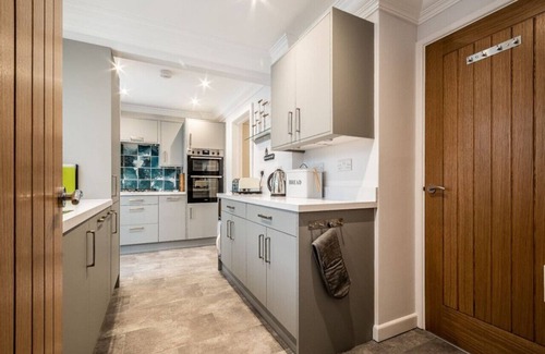 Ebford House | Waterside retreat with estuary views and balcony