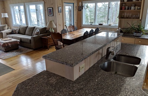 Mac Mahan House | Welcoming vacation home offers a private setting on the water's edge