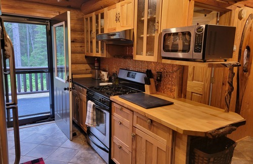 Isabella Cabin | Wilderness Log Home on the River Ely Lakes Fish Hike Ski Snowmobiling ATV Pets