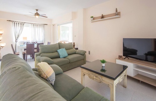 Tavernes de la Valldigna Apartment | With a great sea view from the terrace awaits you this spacious apartment near the beach of Tavernes