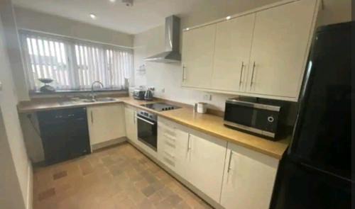 Denbigh House | Y Stabl 94a