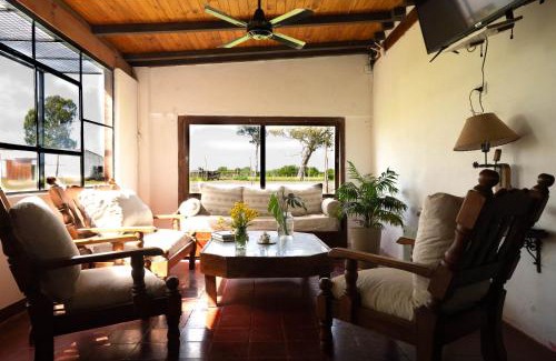 Colonia Libertad House | Yellow Cardinal Lodge