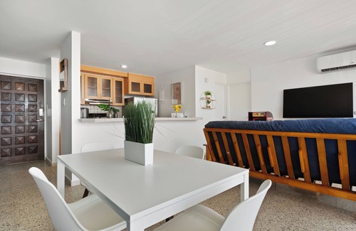 Condado Apartment | Your Exclusive Shoreline Retreat | Stunning Ocean Panoramas | Gated Property Parking