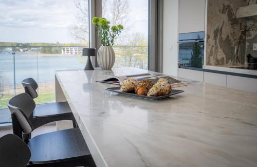 Olsztyn Apartment | Zatoka Premium Elite4Rent apartamenty z panoramicznym widokiem na jezioro i przestronnymi tarasami