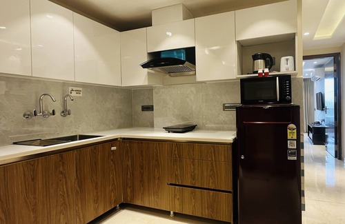 Sector 14 Hotel | ZEN Suites Gurgaon - LUXE Stays Collection