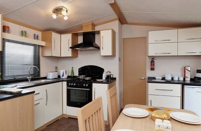 12ft-wide caravan with one double and two twin.