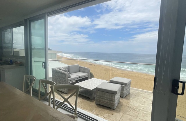 17 steps-newly renovated penthouse apartment on wamberal beach.180degree views
